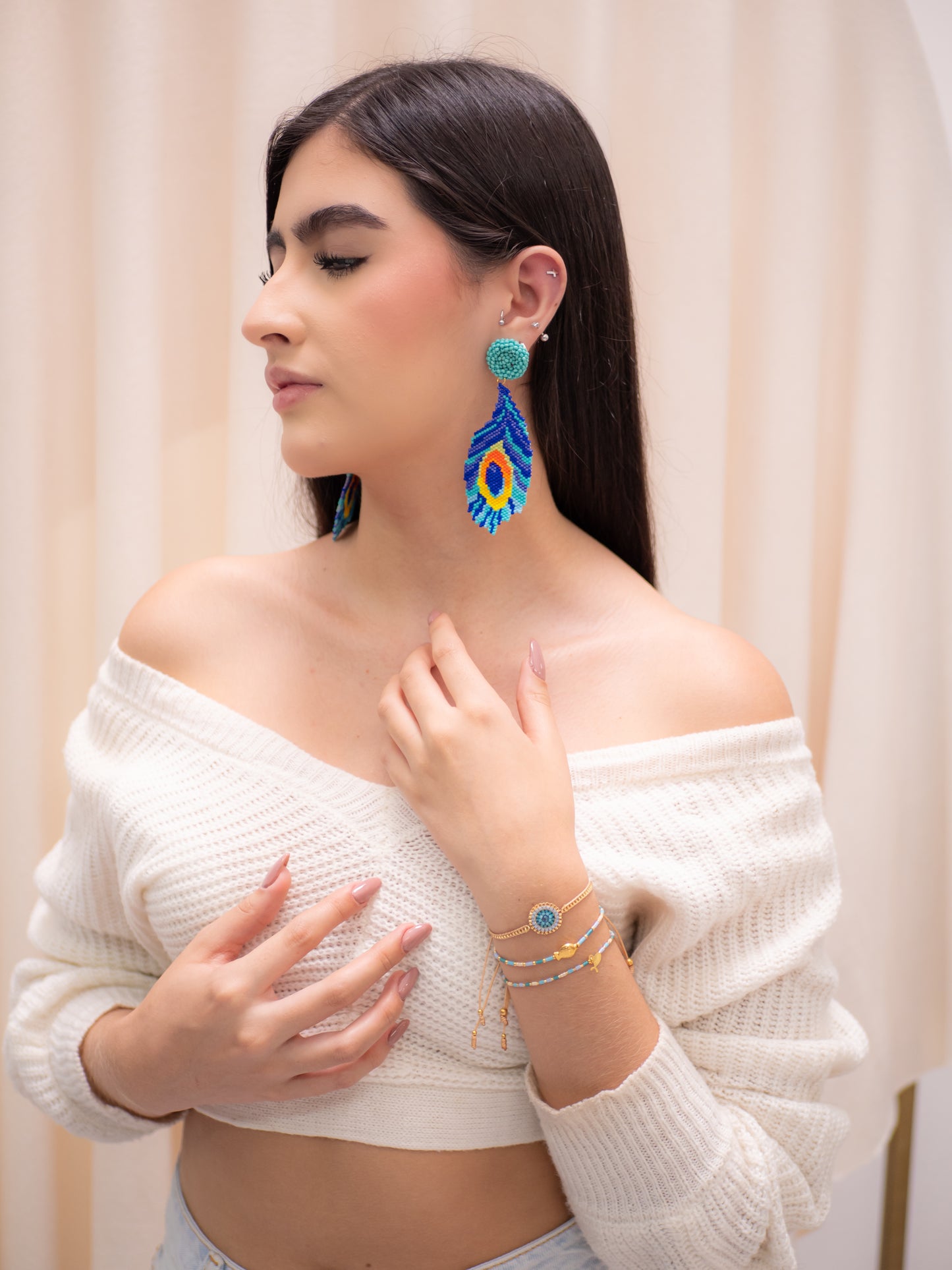 ARETES MIYUKI PLUMAJE REAL